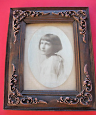Antique Victorian decorated wooden picture photo frame with photo of young girl