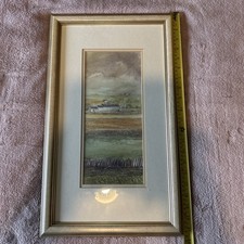 The artwork depicts a rural scene with a farm building