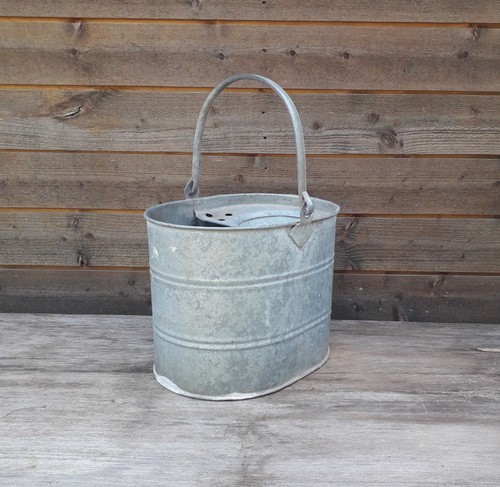 Old used galvanised metal - , mop
