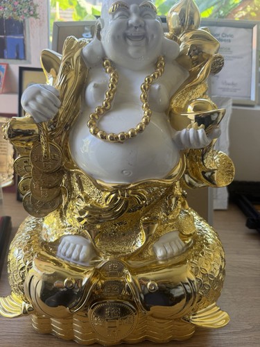 Golden colour laughing buddha - colour,