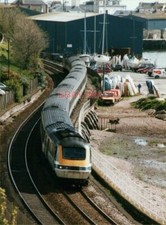 PHOTO  CLASS 43 FIRST GREAT WESTERN HST SET NEGOTIATES TEIGNMOUTH CURVES - FIRST