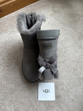 GENUINE UGG BOOTS MINI BAILEY BOW II (GREY) SIZE 7.5 EU40 - B/NEW COST £185