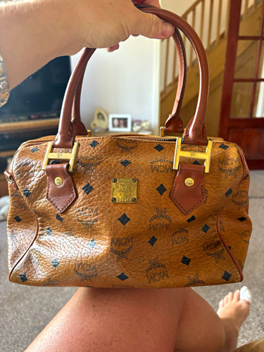 Mcm brown monogram leather zip - mcm,