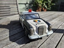 TINPLATE MERCEDES BENZ POLICE CAR litho. Battery operated untested