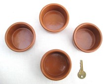 4 Glazed earthenware dishes 3"