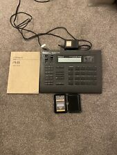 Roland R8 Drum Machine. Includes power supply, Waverex card and manual.