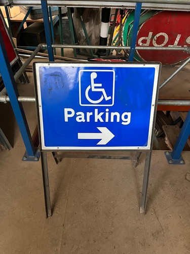 Disabled parking this way - disabled,