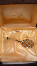 Gold plated tennis racquet & white stone Brooch