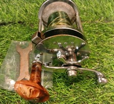 A Vintage Pflueger Sea King 2188 Sea Fishing Multiplier Reel And Spanner.