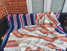 Collection of South American style blankets and fabrics