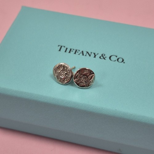 Tiffany notes script - &,