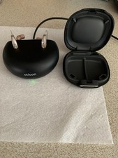 Oticon Rechargeable Hearing Aids With Charger And Hard Case.