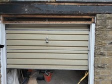 Folding roll up single garage door