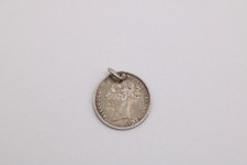 Silver Victorian love token coin charm