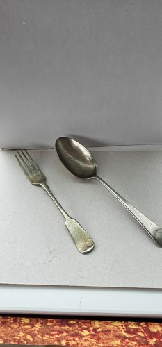 Antique spoon and - antique, fork.