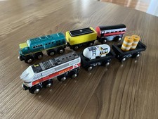 Wooden Train track Trains with magnetic cargo.