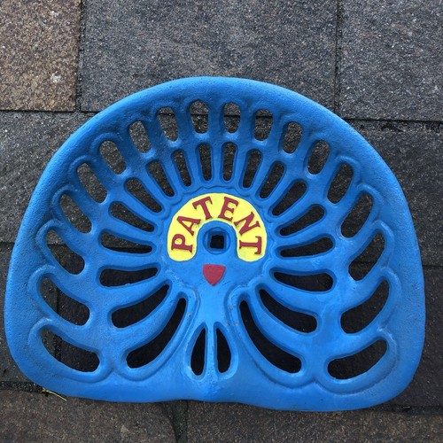 Patent cast iron tractor seat - cast,