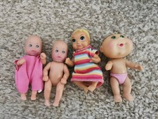 Mattel Small Dolls X 4
