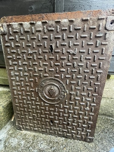 Cast iron manhole cover and - manhole,