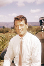 Rock Hudson standing next to a vintage Rolls-Royce car, circa 1960. 4x6 Photo