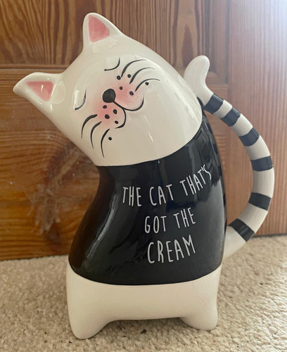 Cat that got - got, cream