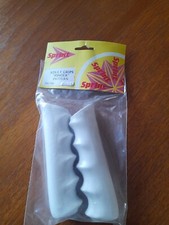 white handlebar grips  vintage