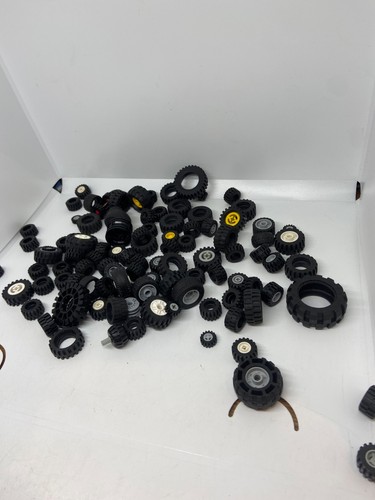 100 vintage lego tyres and - +x,