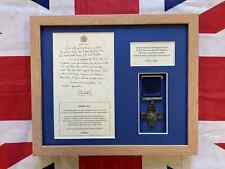 NHS GC and Ambulance Service with George Cross commemorative gift