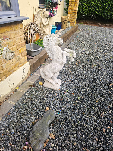 Grey stone rearing horse - stone,