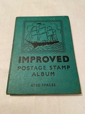 Stanley Gibbons - Improved Postage Stamp Album - with approximately 230 stamps