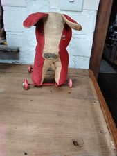 Vintage toy dog wheels - dog, on