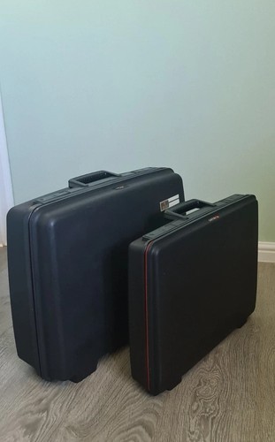 Delsey hard shel - heavy, dutyl