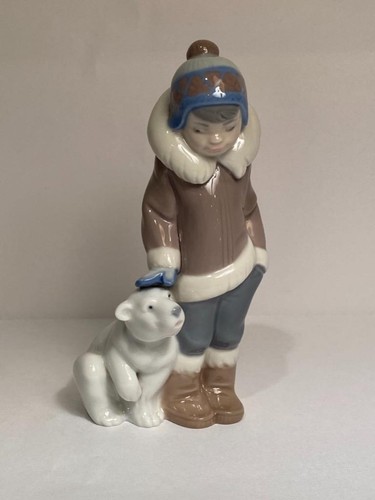 Lladro eskimo boy with - boy,