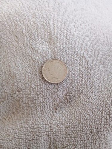 Isle man golfer coin - man,