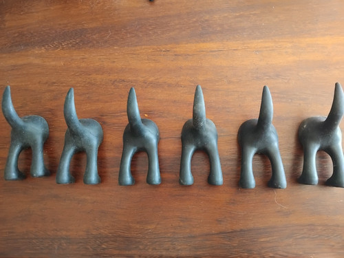 Dog tail coat hooks - ,