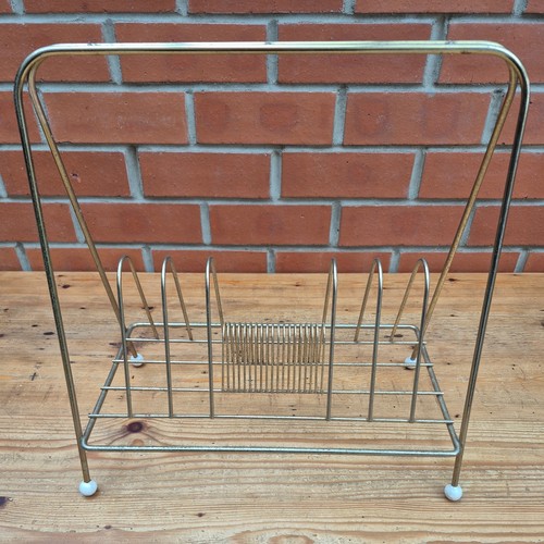 Vintage magazine rack record - magazine,