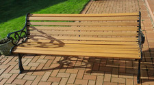Cast Iron ends and oak garden bench. Heavy duty top quality. 