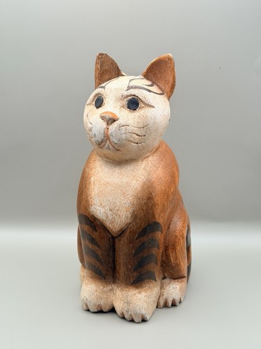 Hand carved wooden cat - hand,