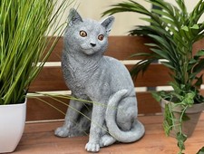 Stone figure sitting cat