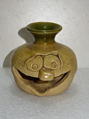 Small pottery vase with - small,