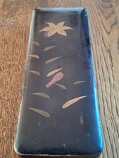 Antique Japanese lacquer box with floral decoration.