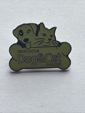 Newcastle Dog And Cat Shelter Metal Badge. 