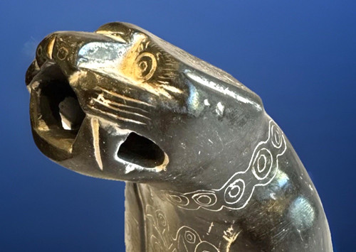 Hand carved stone jaguar - hand,