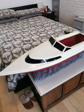 Speedboat hull: fibreglass, red; excellent condition, 47 inches long.