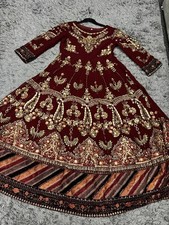 Heavily embellished maroon and
