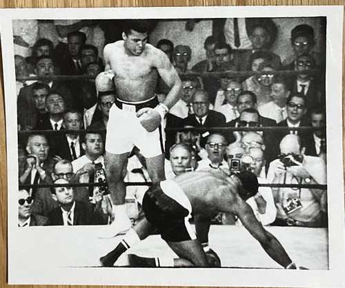 Muhammad ali stands over sonny - muhammad,