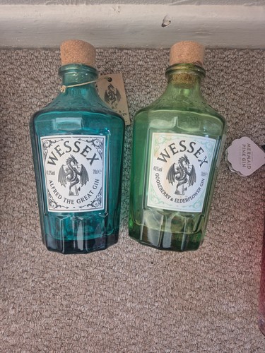 Assorted empty gin - , bottles