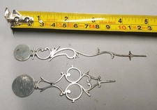 A PAIR OF EARLY STYLE ANTIQUE REPRODUCTION STEEL LONGCASE CLOCK HANDS.