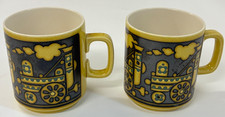 2 X HORNSEA MUGS TRAIN DESIGN