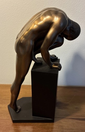 Male nude figurine climbing - male,